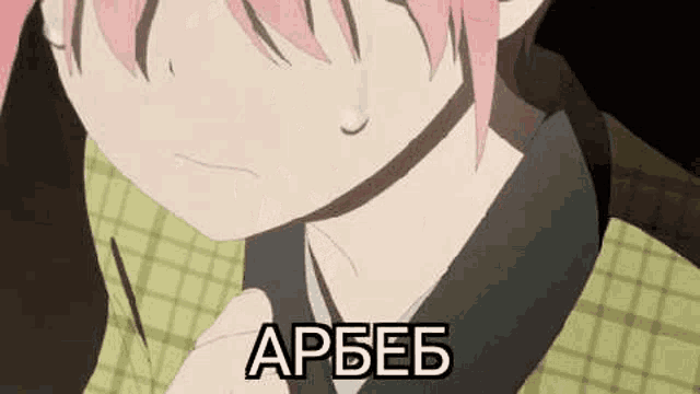 a girl with pink hair is crying with a tear coming out of her eye .