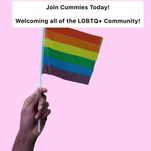 a hand holding a small rainbow flag with the words join cummies today welcomeing all of the lgbtq + community