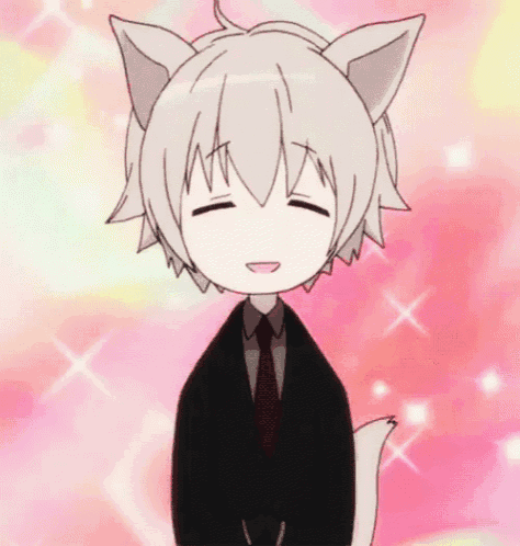 a boy with cat ears is wearing a suit and tie and smiling .