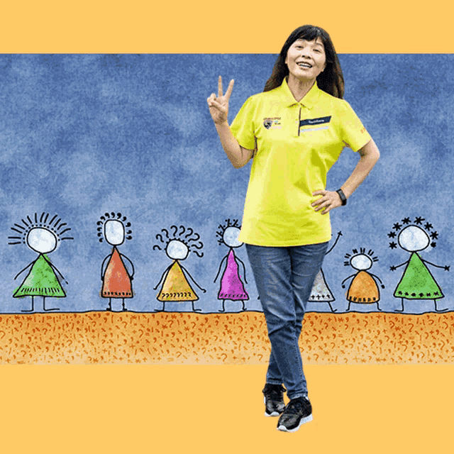 a woman wearing a yellow shirt that says ' toyota ' on the front