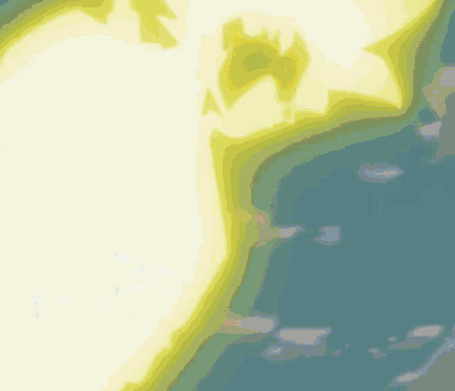 a green and yellow background with a glowing object coming out of it .