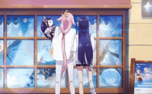 two anime girls are standing next to each other in front of a store window looking at a doll .