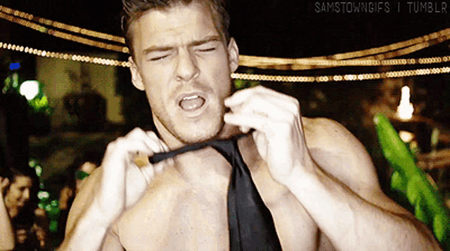 a shirtless man is adjusting his tie with the words samstowngifs i tumblr written below him