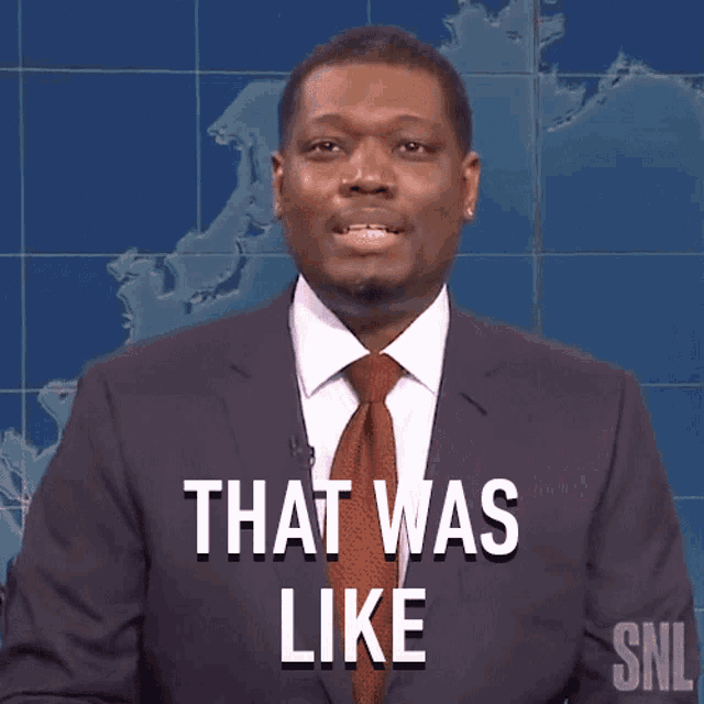 a man in a suit and tie says " forty years ago snl "