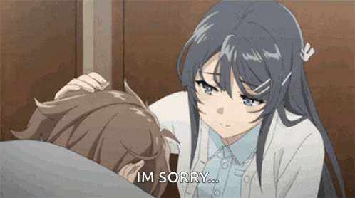 a girl is putting her hand on a boy 's forehead and saying `` i 'm sorry '' .