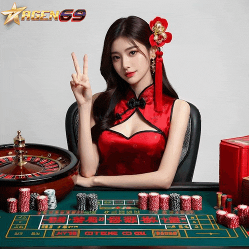 a woman in a red dress is sitting at a table with chips and a roulette wheel in front of a sign that says agengg