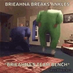 a couple of men in green pajamas are jumping in the air .