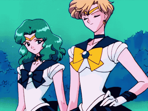 a couple of anime characters standing next to each other and holding hands