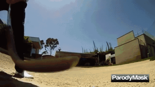 a parody mask video shows a person riding a skateboard down a dirt road