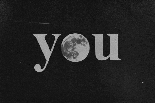 a black and white photo of the words `` you '' with a full moon in the middle .
