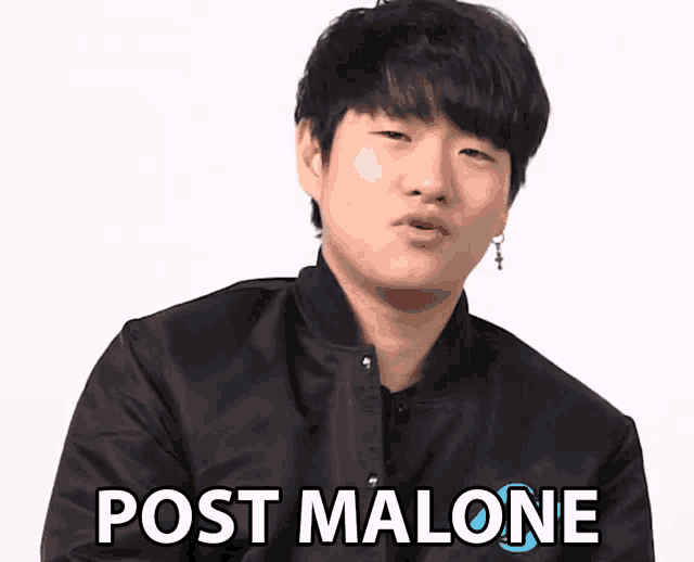 a man wearing a black jacket with the words post malone on the front
