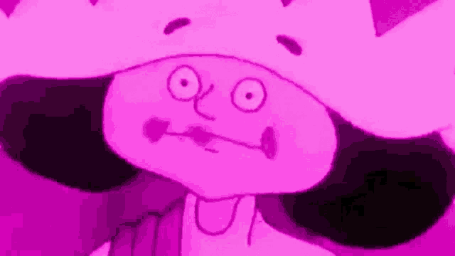 a close up of a cartoon character wearing a crown on a pink background .
