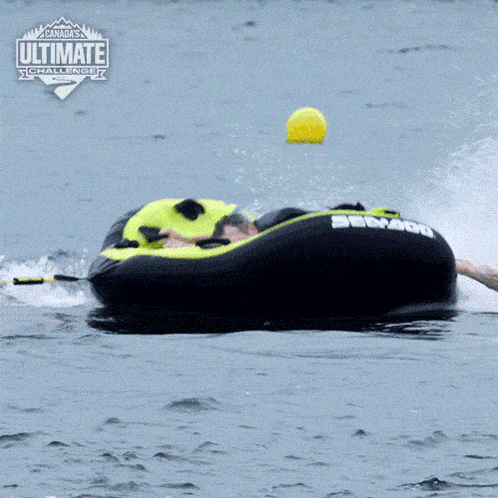 Holding On To The Inflatable Boat Bradley Farquhar GIF - Holding On To The Inflatable Boat Bradley Farquhar Canadas Ultimate Challenge GIFs