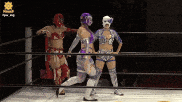 three women are in a wrestling ring with the hashtag #pw_mg at the bottom
