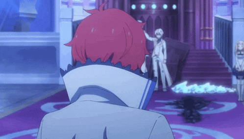 a man with red hair stands in front of a purple wall