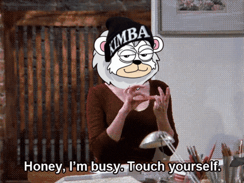 a woman wearing a beanie that says kimba on it