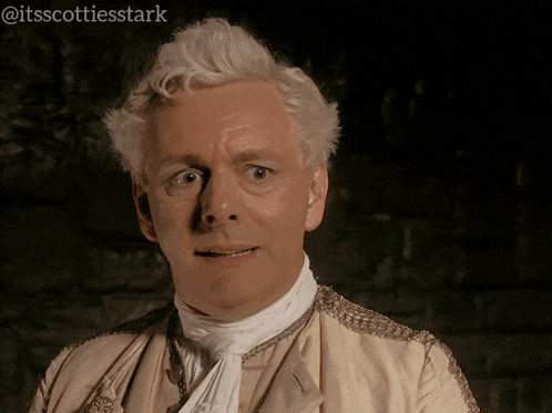 a close up of a man 's face with the hashtag @itsscottiesstark
