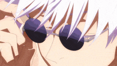 a close up of a person wearing sunglasses with purple lenses