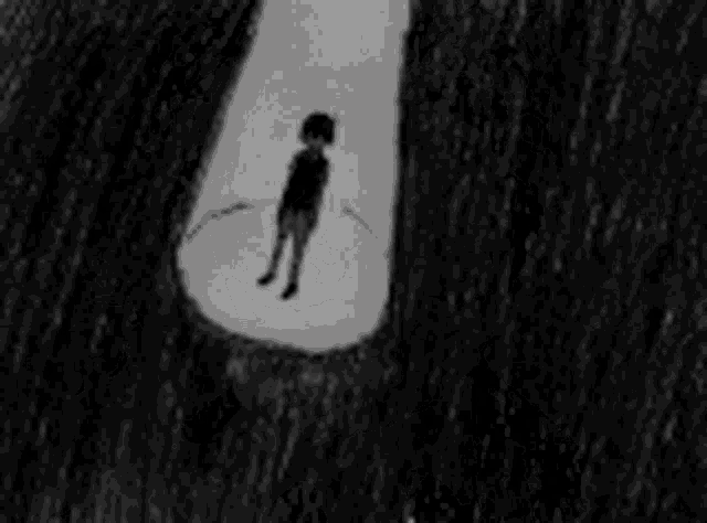 a black and white drawing of a boy covering his face .