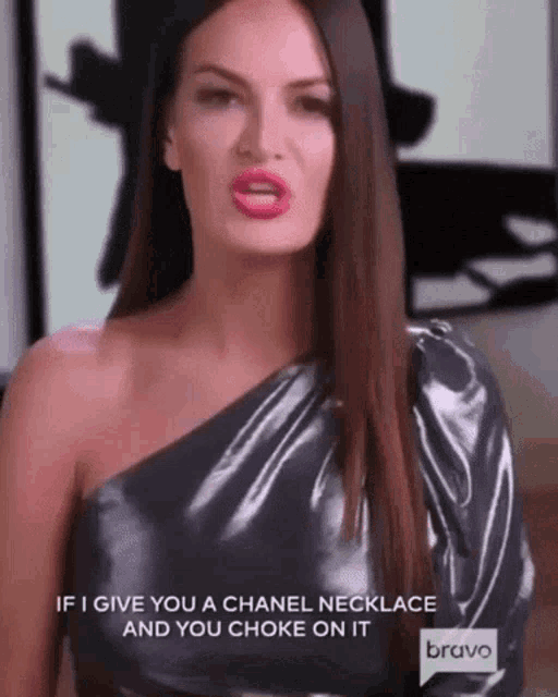 a woman is talking about a chanel necklace