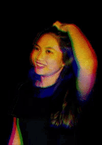 a pixelated image of a woman in a black shirt with a rainbow background
