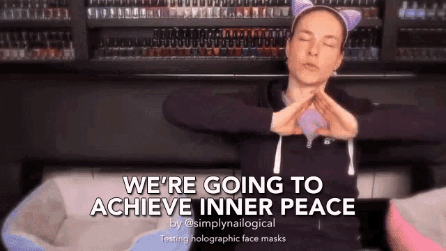 a woman wearing a cat ear headband says " we 're going to achieve inner peace "