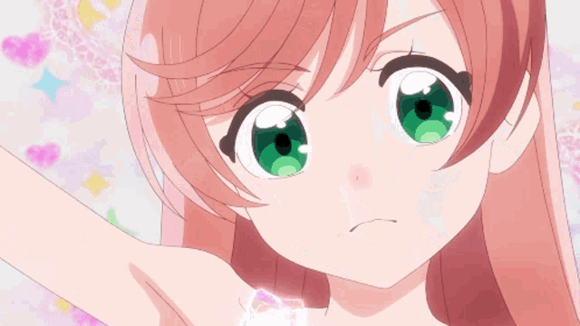 a girl with pink hair and green eyes is holding a toy