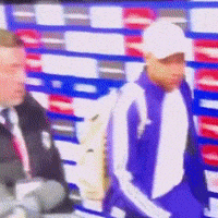 a blurry picture of a man in a white hat