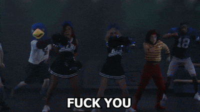 a cheerleader wearing a hfb shirt is surrounded by other people