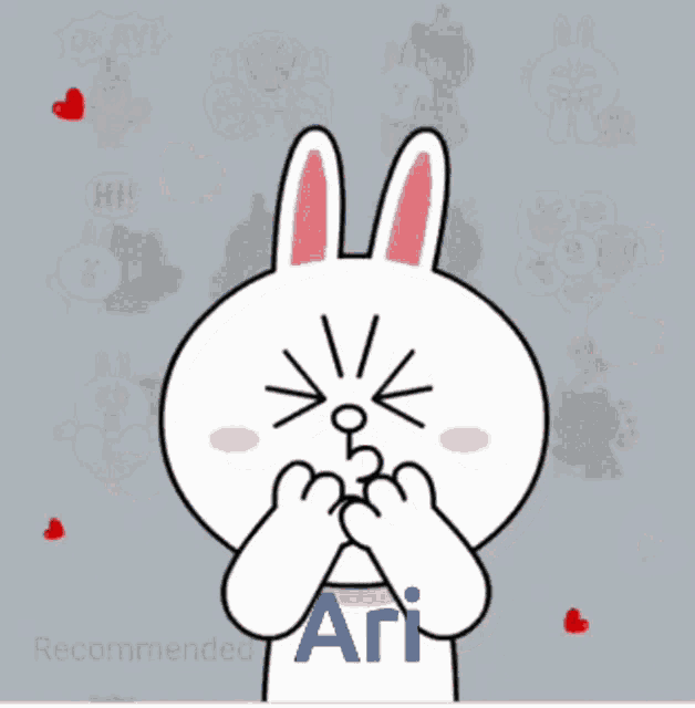 a cartoon bunny holding a red heart with the name ari written on it