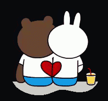 a bear and a rabbit are sitting next to each other with a heart on their backs