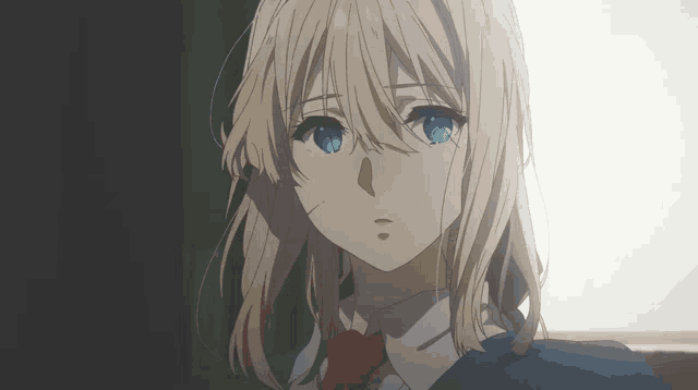 a girl with blonde hair and blue eyes is wearing a blue jacket and red tie