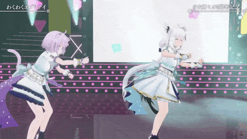 two anime girls are dancing on a stage with chinese writing on the bottom right corner