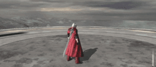 a person in a red cape is flying through the air in a video game