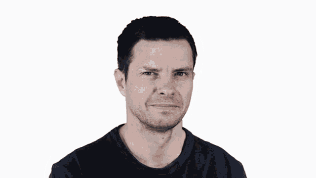 a man is covering his mouth with his hand