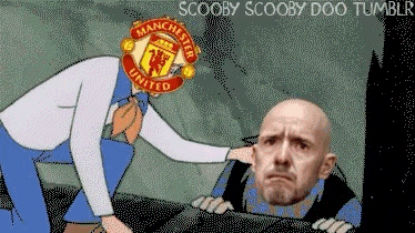 a cartoon of scooby doo putting a manchester united logo on a bald man 's head .