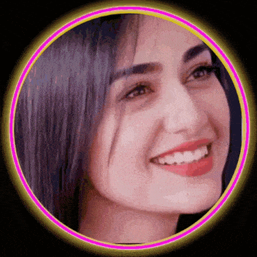 a close up of a woman 's face with a neon circle around it