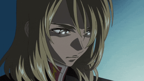 a close up of a person 's face with blonde hair