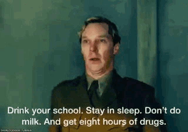 a man in a suit and tie is saying `` drink your school . stay in sleep . do n't do milk . ''