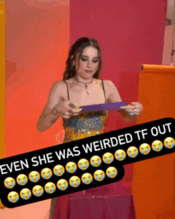 a woman is holding a piece of paper that says " even she was weirded tf out "