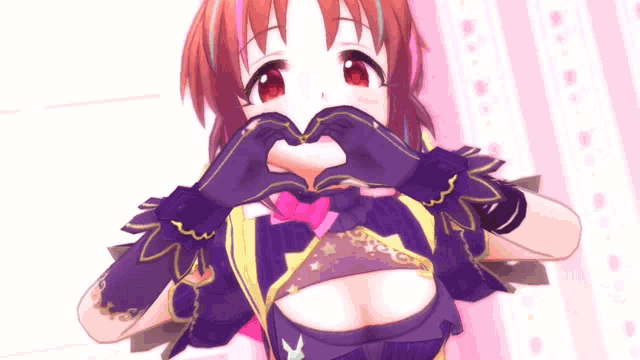 a girl making a heart shape with her hands in front of her face