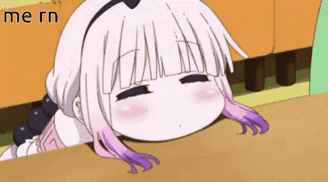 a girl with purple hair is laying on a table with the words mern written above her