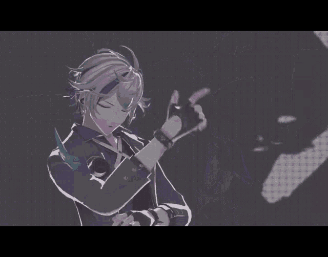 a man with a microphone in his ear is pointing