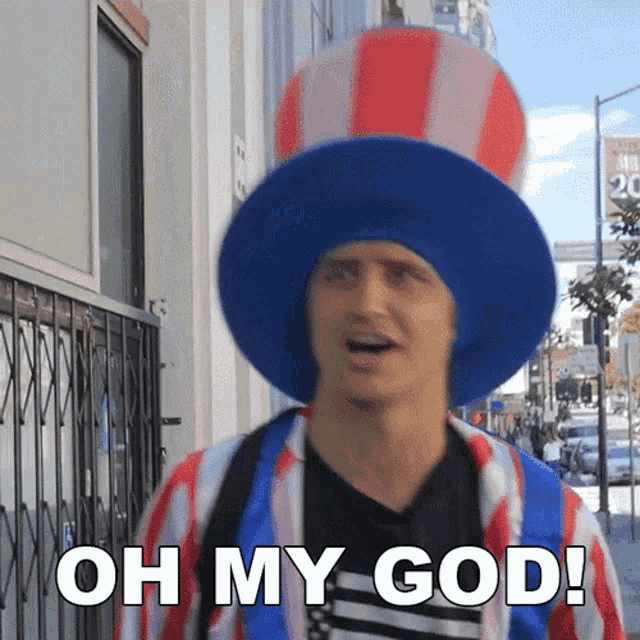 a man wearing a red white and blue hat with the words oh my god