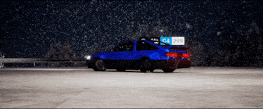a blue car with a c4 299 sign on top