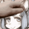 a person is holding a donut over a girl 's face .