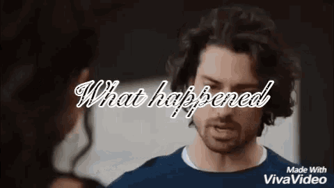 a man and a woman are talking to each other and the words `` what happened '' are visible in the background .