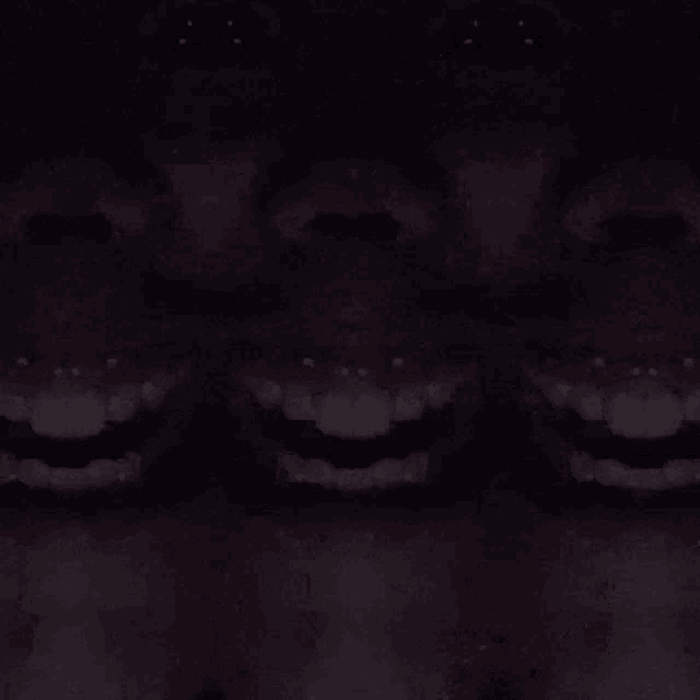 a close up of a person 's mouth and eyes