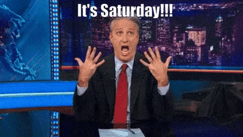 a man in a suit and tie is saying it 's saturday !!!