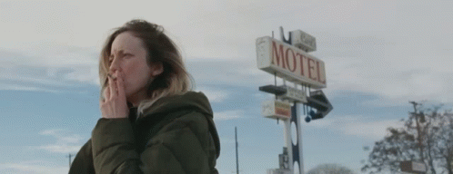 Leslie Smoking In Front Of A Motel In To Leslie Leslie GIF - Leslie Smoking In Front Of A Motel In To Leslie To Leslie Leslie GIFs